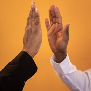 Two men high-fiving